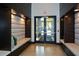 Building lobby with double doors, and bench seating at 855 Peachtree Ne St # 2412, Atlanta, GA 30308