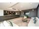 Relaxing lounge area with comfortable seating and a large screen TV at 855 Peachtree Ne St # 2412, Atlanta, GA 30308
