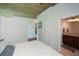 Large main bedroom with ensuite bathroom, ample natural light, and modern decor at 855 Peachtree Ne St # 2412, Atlanta, GA 30308