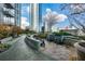 Relaxing rooftop patio with seating and city views at 855 Peachtree Ne St # 2412, Atlanta, GA 30308