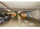 One-way parking garage with designated parking spots at 855 Peachtree Ne St # 2412, Atlanta, GA 30308