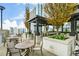 Relaxing outdoor patio with tables and chairs at 855 Peachtree Ne St # 2412, Atlanta, GA 30308