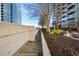 A serene walkway with landscaping and city views at 855 Peachtree Ne St # 2412, Atlanta, GA 30308