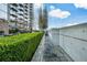 Walkway with lush hedges and city views at 855 Peachtree Ne St # 2412, Atlanta, GA 30308