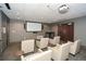 Community theater room with comfortable seating and a large projection screen at 855 Peachtree Ne St # 2412, Atlanta, GA 30308