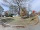 House nestled on a corner lot with mature trees at 851 Forest Path, Stone Mountain, GA 30088