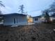 Single-story home exterior with a patio and grassy backyard at 4193 Port Chester Way, Decatur, GA 30034