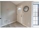 Bright entryway with a white door and wood-look floors at 3814 Whaley Ct, Snellville, GA 30039