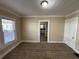 Dining room with access to kitchen and wood floors at 126 Wellington Sw St, Atlanta, GA 30314