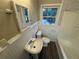 Clean bathroom, featuring a shower/tub combo and pedestal sink at 1959 Bandera Dr, Decatur, GA 30032