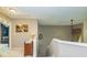 Upstairs hallway with a view of a bedroom and staircase at 207 Persimmon Trl, Woodstock, GA 30188