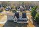 Aerial view of the home's back, highlighting the deck and surrounding landscape at 1019 Walnut Creek Dr, Woodstock, GA 30188