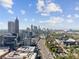 High-rise buildings and a busy highway are visible in this aerial cityscape view at 805 Peachtree Ne St # 307, Atlanta, GA 30308