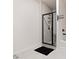 Modern bathroom with a walk-in shower, tiled walls, and contemporary fixtures at 3934 Saddle Bag Ct, Dacula, GA 30019