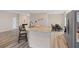 Modern kitchen with granite countertops, stainless steel appliances, and a breakfast bar at 3934 Saddle Bag Ct, Dacula, GA 30019