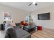 Cozy living room with comfortable seating, large windows, and stylish decor at 3934 Saddle Bag Ct, Dacula, GA 30019