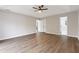 Spacious bedroom with wood-look flooring and ceiling fan at 934 Bay Ridge Dr, Lawrenceville, GA 30045