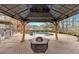 Gazebo with a built-in fire pit overlooking the pool at 219 Regency Ct, Acworth, GA 30102