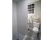 Stylish bathroom with marble tile shower, modern vanity, and decorative floor tile at 4001 Red Oak Dr, Atlanta, GA 30340