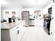 Bright, updated kitchen with white cabinets, stainless steel appliances, and granite countertops at 4001 Red Oak Dr, Atlanta, GA 30340