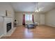 Inviting living room with fireplace, wood floors, vaulted ceiling, and lots of natural light at 126 Old Rudy York Nw Rd, Cartersville, GA 30121