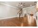 Hardwood floor living room with fireplace and staircase at 211 Alderwood Ne Pt, Atlanta, GA 30328