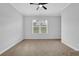 Empty bedroom with carpet and ceiling fan at 812 Levi Farms Ln, Canton, GA 30115