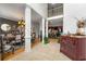 Foyer with tile floor, columns and view to dining room at 10119 Azalea Dr, Covington, GA 30014