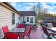 Backyard deck with patio furniture and a storage shed at 320 Spring Creek Dr, Stockbridge, GA 30281