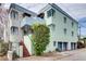 Unique exterior with pastel green and white color scheme and attached garages at 589 Auburn Ne Ave # H, Atlanta, GA 30312