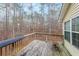 Wooden deck overlooking a wooded backyard at 2158 Belcourt Dr, Villa Rica, GA 30180