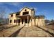 Rear exterior view of a two-story home under construction at 1975 Sage Lake Bend Sw, Marietta, GA 30064