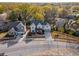 Aerial view of two-story home with landscaped yard and neighborhood at 370 Park Ne Pl, Atlanta, GA 30317