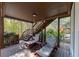 Covered deck with lounge chairs and a view of another deck at 239 Morning Mist Way, Woodstock, GA 30189