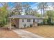 Newly painted ranch home with a carport at 2479 Brentwood Rd, Decatur, GA 30032