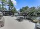 Poolside seating area ideal for outdoor gatherings and events at 303 River Mill Cir, Roswell, GA 30075