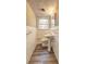 White bathroom with pedestal sink and tiled walls at 2371 Oakridge Ct, Decatur, GA 30032