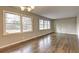 Bright dining room with polished hardwood floors and multiple windows at 2371 Oakridge Ct, Decatur, GA 30032