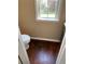 Half bathroom with hardwood floors at 635 Arncliffe Ct, Johns Creek, GA 30005