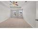 Spacious bedroom with neutral carpeting and ceiling fan at 358 Elgin Dr, Lawrenceville, GA 30045