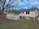Spacious backyard with a deck, perfect for outdoor entertaining at 3967 Evelyn Dr, Powder Springs, GA 30127