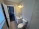Bathroom with vanity, toilet, and tiled walls at 941 Capitol View Ave, Atlanta, GA 30318