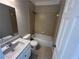 Bathroom with tiled shower, white vanity, and toilet at 941 Capitol View Ave, Atlanta, GA 30318