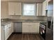 Bright kitchen featuring white cabinets, stainless steel appliances, and granite countertops at 941 Capitol View Ave, Atlanta, GA 30318