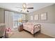 Light and bright bedroom with twin bed and neutral decor at 958 Idlewood Dr, Canton, GA 30115