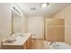 Basement bathroom with tub, shower and double vanity at 6320 Murets Rd, Alpharetta, GA 30022