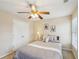 Bedroom with ceiling fan and double closet at 6320 Murets Rd, Alpharetta, GA 30022