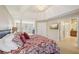 Large main bedroom with ensuite bathroom access at 6320 Murets Rd, Alpharetta, GA 30022