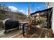 Spacious backyard deck with gazebo, grill, and outdoor dining area at 264 Creek View Pl, Canton, GA 30114