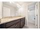 Bathroom with granite vanity, mirror, and shower/tub combo at 264 Creek View Pl, Canton, GA 30114